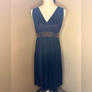 Vintage Jessica Howard Size 8 black dress with orange beadwork